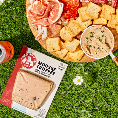 A pack of Mousse Truffee and a charcuterie board.